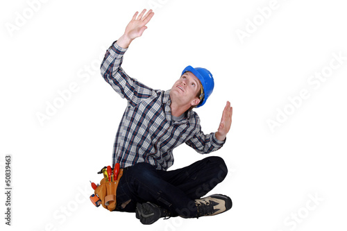 Photo: Laborer gesturing, studio shot Laborer gesturing, studio shot