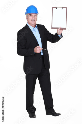 Photo: Inspector with a clipboard Inspector with a clipboard