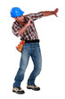 Workers holding encombrant object