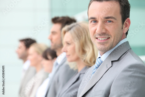 Photo: Business people lined up Business people lined up