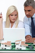 real estate businessman and his secretary working