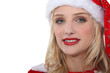 Portrait of woman with Santa hat