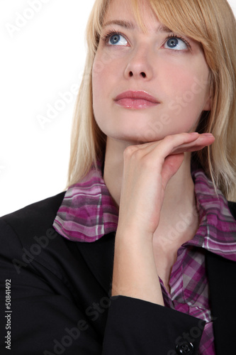 Photo: young woman thinking young woman thinking