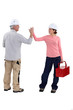 Man and woman holding hands and tools