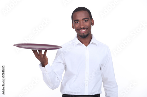 Photo: Waiter holding tray Waiter holding tray