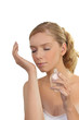 woman smelling a perfume
