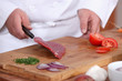 Photo: Male hands preparing steak Male hands preparing steak