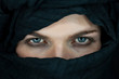 eyes of a beautiful man with black scarf