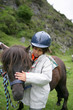 Foto: Child with a pony Child with a pony