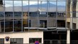 reflection through building