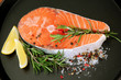 Fresh salmon steak on pan, close up