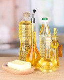Different types of oil on table in kitchen