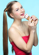 Foto: Young woman with ice cream Young woman with ice cream