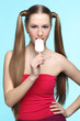 Foto: Young woman with ice cream Young woman with ice cream