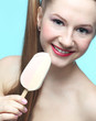 Foto: Young woman with ice cream Young woman with ice cream