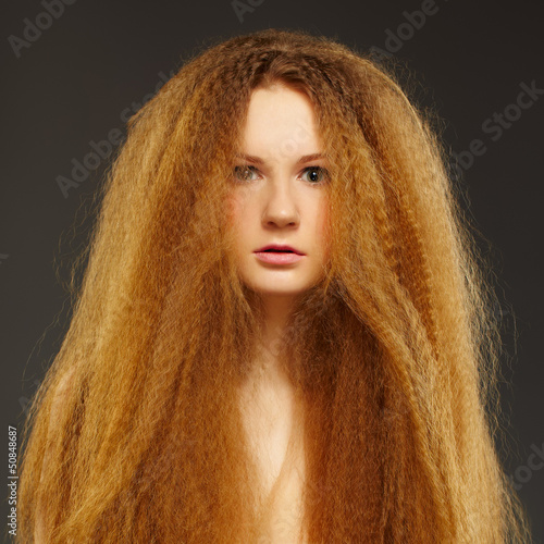 Photo: beautiful curly red-haired woman beautiful curly red-haired woman