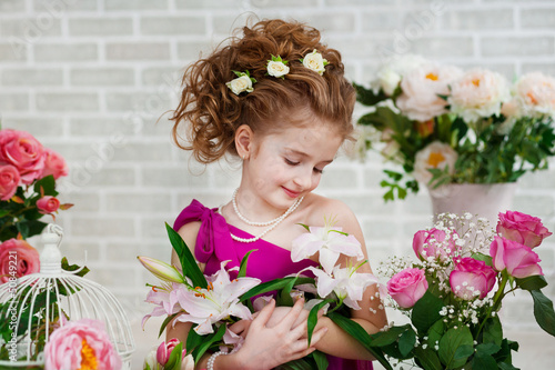 Photo: Beautiful girl with flowers Beautiful girl with flowers
