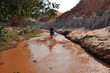 Red river between rocks and jungle, Mui Ne, Vietnam