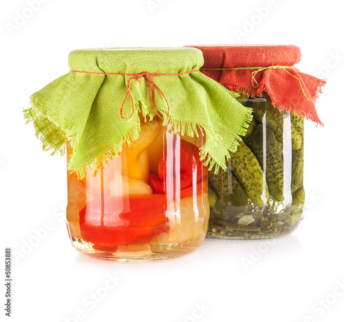 Photo: Pickled paprika and cucumber isolated on white background Pickled paprika and cucumber isolated on white background