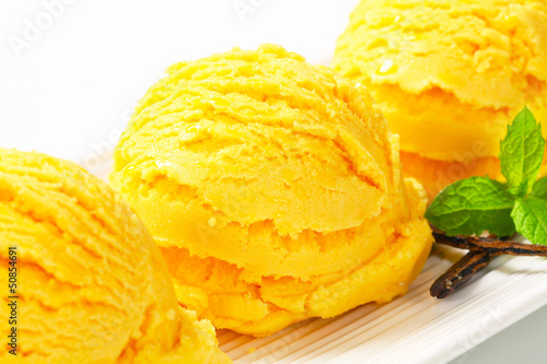 Photo: Scoop of yellow ice cream Scoop of yellow ice cream