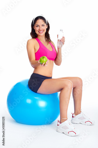 Photo: Young beautiful fitness woman. Young beautiful fitness woman.