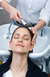 attractive woman washing her hair