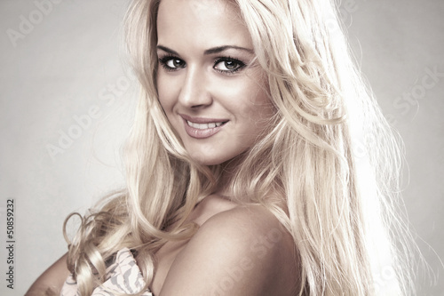 Photo: Beautiful smiling blond woman Beautiful smiling blond woman