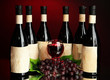 Composition of wine bottles, glass and  grape,