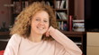 Portrait of blond curly hair teenager  - tracking shot