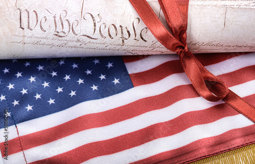 Photo: United States of America Constitution and USA flag United States of America Constitution and USA flag