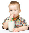 Cute little boy with a glass of milk