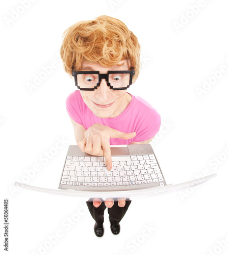 Photo: Funny nerdy guy with a laptop computer Funny nerdy guy with a laptop computer