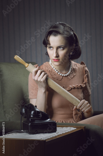 Photo: Angry wife waiting for her husband Angry wife waiting for her husband