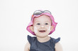  Baby mit Creme im Gesicht