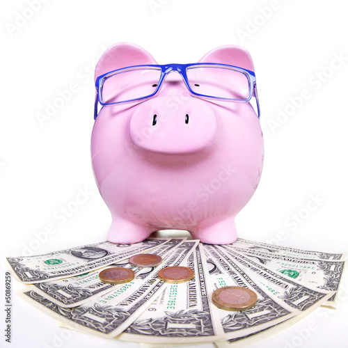 Photo: Piggy bank with money. Piggy bank with money.