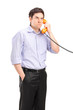 Angry man having a telephone conversation