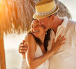 Photo: Happy senior couple in love at tropical beach Happy senior couple in love at tropical beach