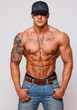 Hot shirtless guy in cup and with headphones