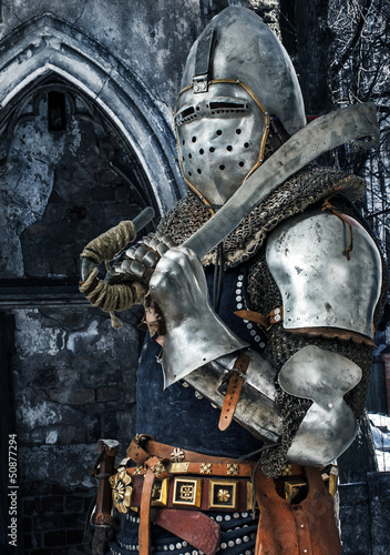 Photo: Armored knight with his sword Armored knight with his sword