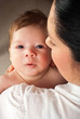 Mother holding newborn baby