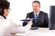Businessman and businesswoman discuss business