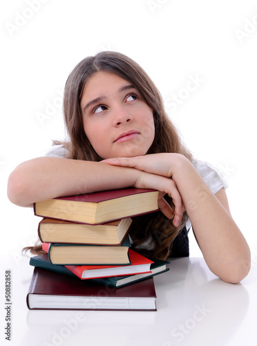 Photo: Pretty teenager with books Pretty teenager with books