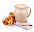 jar of milk, tasty bagels, isolated on white