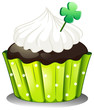 Vector: A chocolate cupcake with a green plant A chocolate cupcake with a green plant