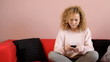 Portrait of pretty girl with mobilephone - tracking shot