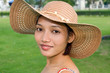 portrait of a young woman in a hat.