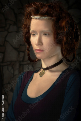 Photo: Portrait of redhead woman stylized as old picture Portrait of redhead woman stylized as old picture