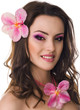 Photo: Beautiful woman with orchid flower Beautiful woman with orchid flower