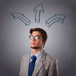 Handsome man thinking with arrows overhead