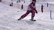 Seven-year girl participates in downhill skiing